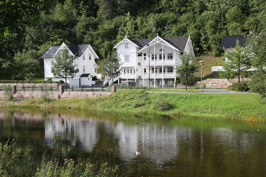 Old wooden architecture in Sandvika, Norway. White home