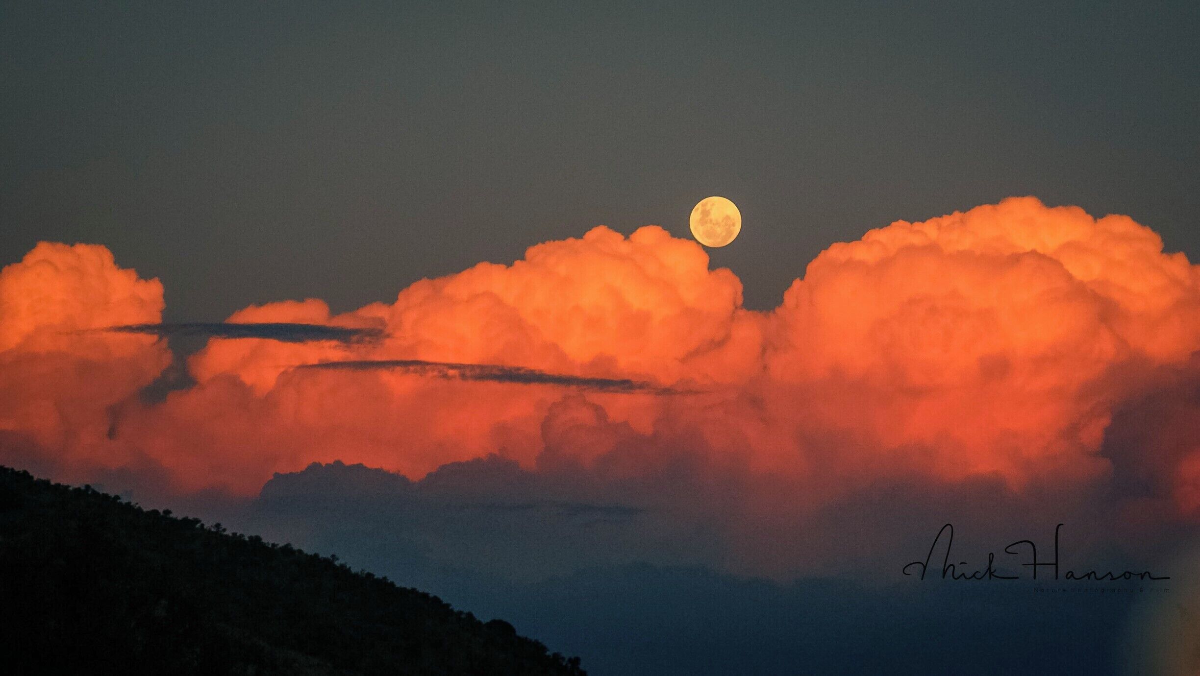 Heading out on a night safari during our honeymoon with this storm building in the distance just as the sun was going down.