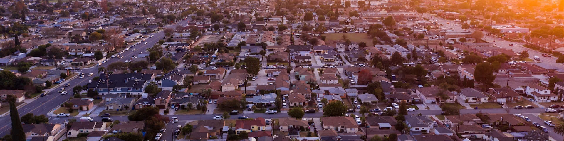 Sunset aerial view of a neighborhood in Downey, California, USA.