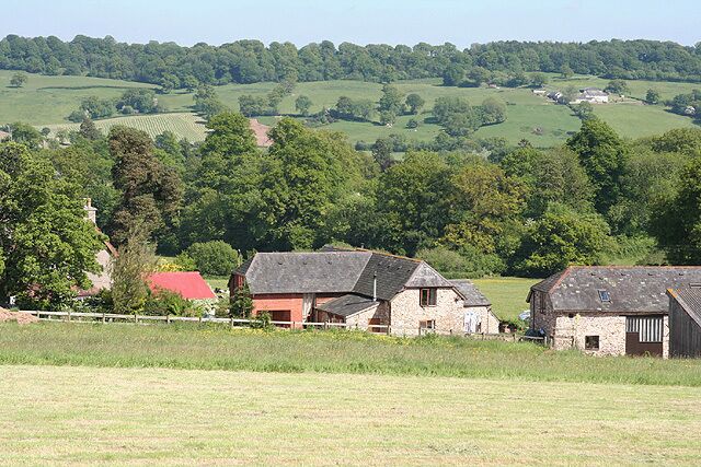 Upottery: overlooking Glebe Farm. Barns converted to residences. Looking south east