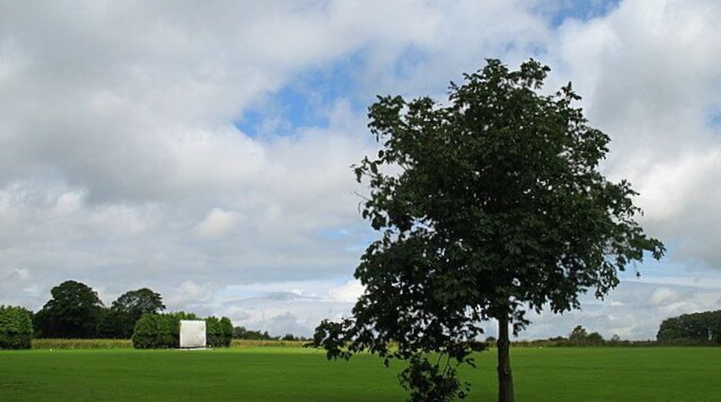 Birdlip & Brimsfield cricket pitch The sightscreen in the distance gives it away. A very scenic little cricket ground.