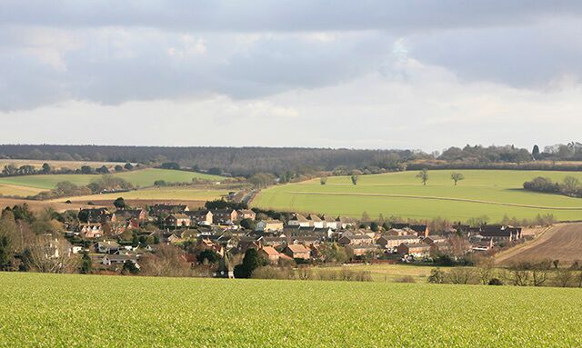 View of King's Somborne from Yew Hill. Looking SE from footpath atop Yew Hill. This is only part of King's Somborne, since the A3057 and adjacent properties are screened by hill in foreground.