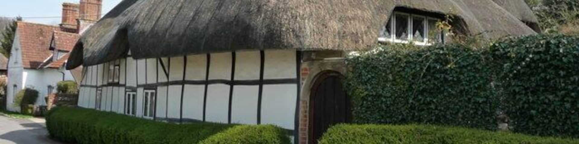 Nether Wallop. One of the many thatched cottages in the village. This one is on Five Bells Lane.
