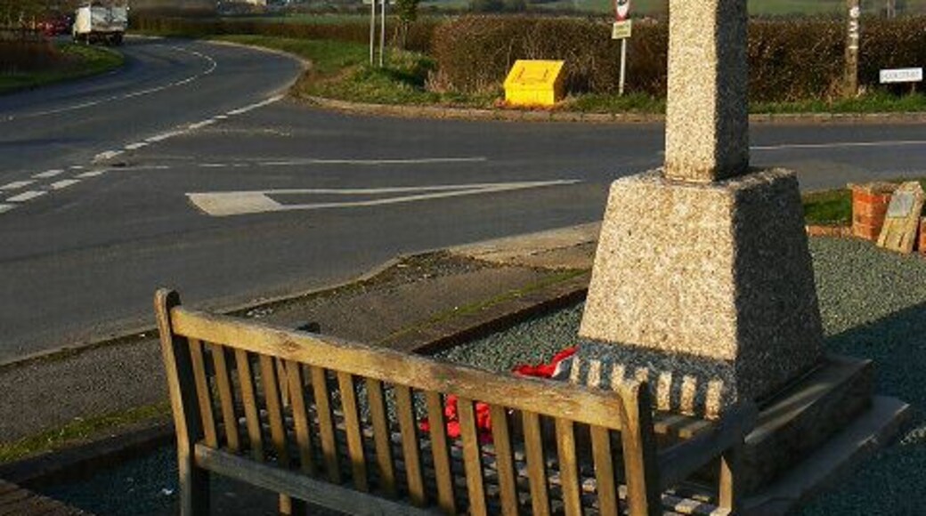 War memorial, Hook Street and the road to Purton. Hook Street is to the right. The war memorial is in pristine condition. Hook is a small village in Wiltshire, England between the town of Royal Wootton Bassett and the village of Purton, just north of the M4 motorway. It is in the civil parish of Lydiard Tregoze.