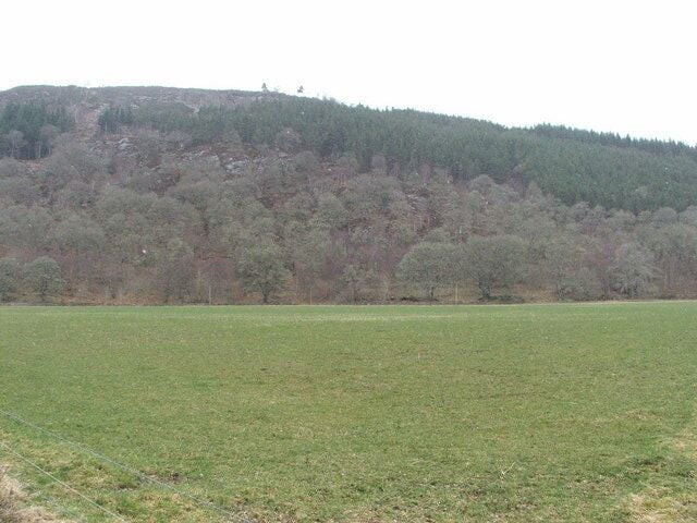 Farmland. Looking north west over grazing land with Creag an Daraich in the background.