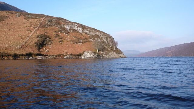 Loch Luichart and deer fence The deer fence crosses the South side of the 506m point to protect a fine area of birch wood.