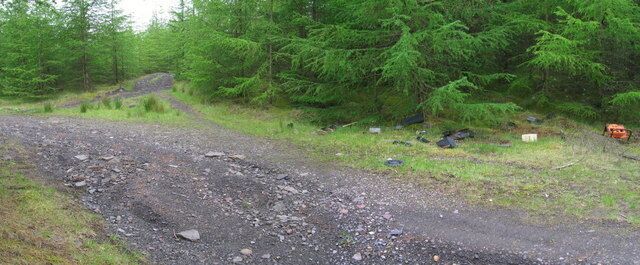 Dumped A sad fact about these forest tracks in reclaimed mining country is the detritus of modern life that is dumped all along them. Ahead is yet another complicated junction only partly marked on the 1:25000 OS map. I don't know what the orange thing used to be, but just behind me was a video-recorder, a couple of televisions, and a fridge-freezer. It is a shame.