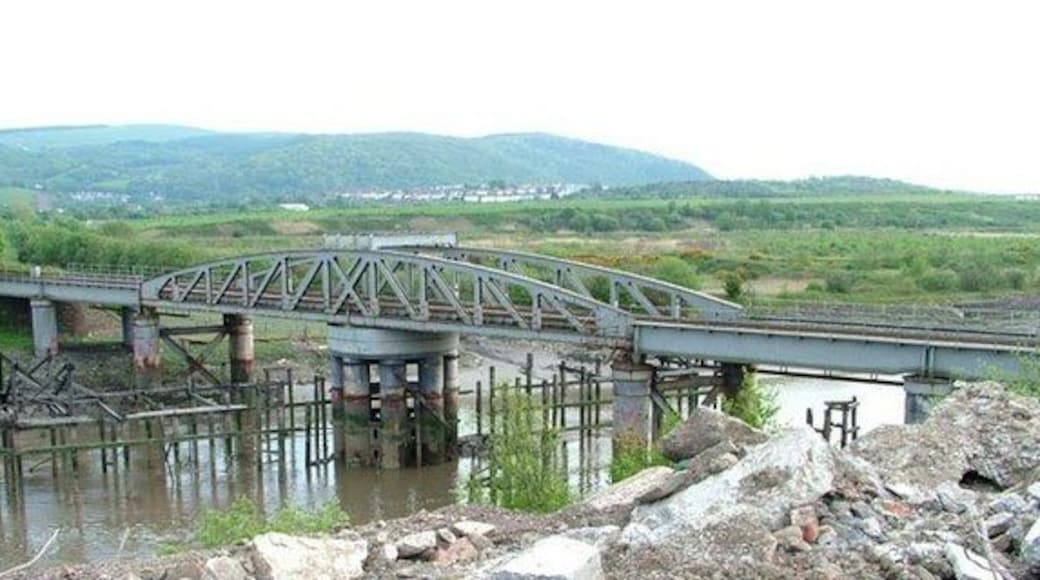 Neath Abbey Swing Bridge The Rhondda and Swansea Bay Railway Company opened its line in 1885, but could extend the line into Swansea until this swing bridge was completed in 1894. I am grateful to the owner of Derwent Construction and his plant operator Martin for their assistance in getting this image. This is one of over 1,450 movable bridges in the British Isles that I have identified for my historical website. www.movablebridges.org.uk
