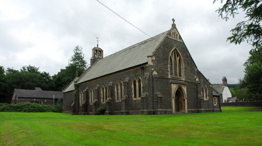 St. Margaret's Church, Crynant. St. Margaret's Church was built in the early 20th century. The partly white-washed building to the right is the 'Chapel of Ease' (circa 1500). The building to the left is the telephone exchange.