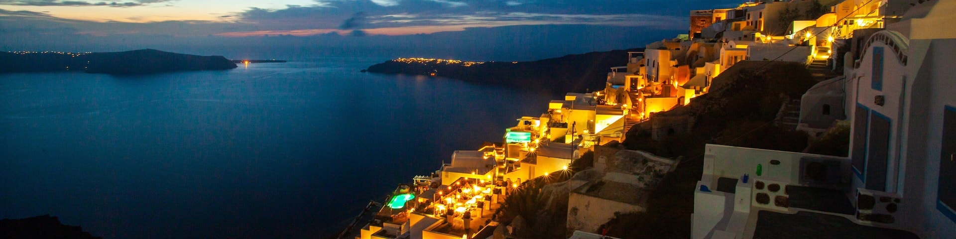 Greece featuring general coastal views, night scenes and a sunset