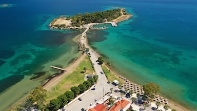 Aerial drone photo of famous island of dreams or Pesonisi connecting with small road with seaside fishing village of Eretria, Central Evia island, Greece