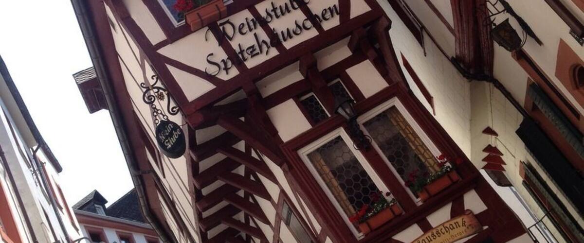 One of those Trover opps which is just too hard to overlook. The town of Bernkastel-Kues holds many more gems, apart from the wine, food and a boat ride.
Btw this house is not that small, the guy in the picture was just pretty big... http://www.bernkastel.de/a-z/a-z/spitzhaeuschen-weinstube-schmitz-herges.html