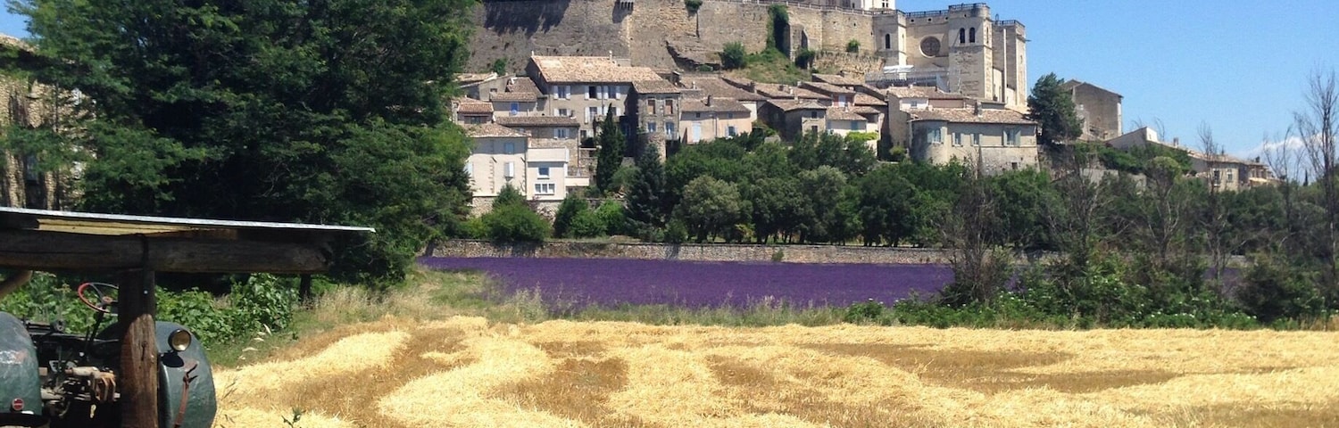 Green field, tractor, mown wheat, lavender and a hilltop town. How gorgeous is Cote de Rhone, Provence? #colorful