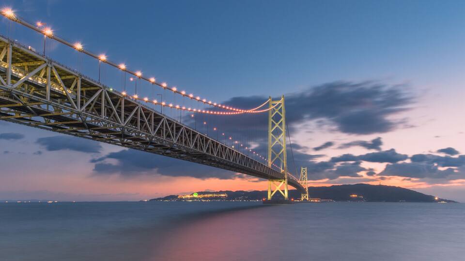 Akashi Kaikyo Bridge or Pearl Bridge is the world's largest suspension bridge, the largest island in the Seto Inland Sea. The Bridge is communication from Awaji Island to Kobe, Japan.