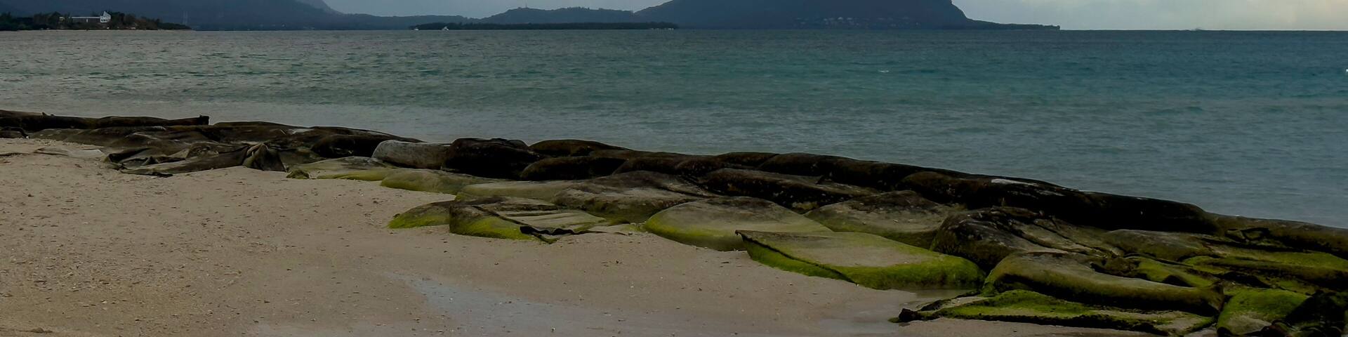 Spectacular clouds over Le Morne Brabant as seen from La Preneuse beach in Mauritius