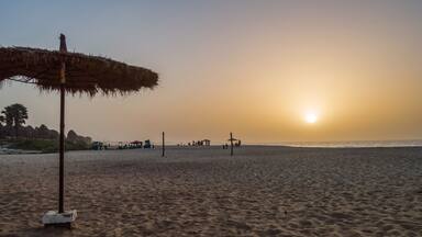 Beautiful long sandy beach in The Gambia,