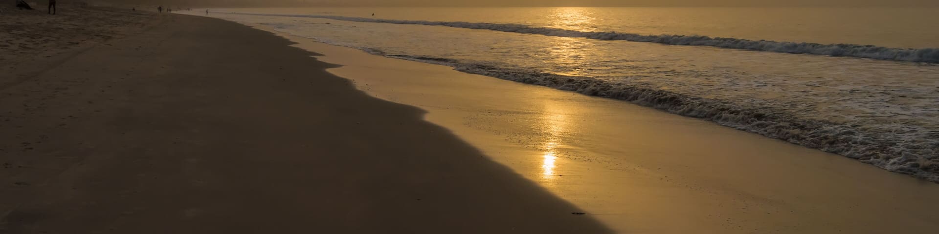 Beautiful long sandy beach in The Gambia