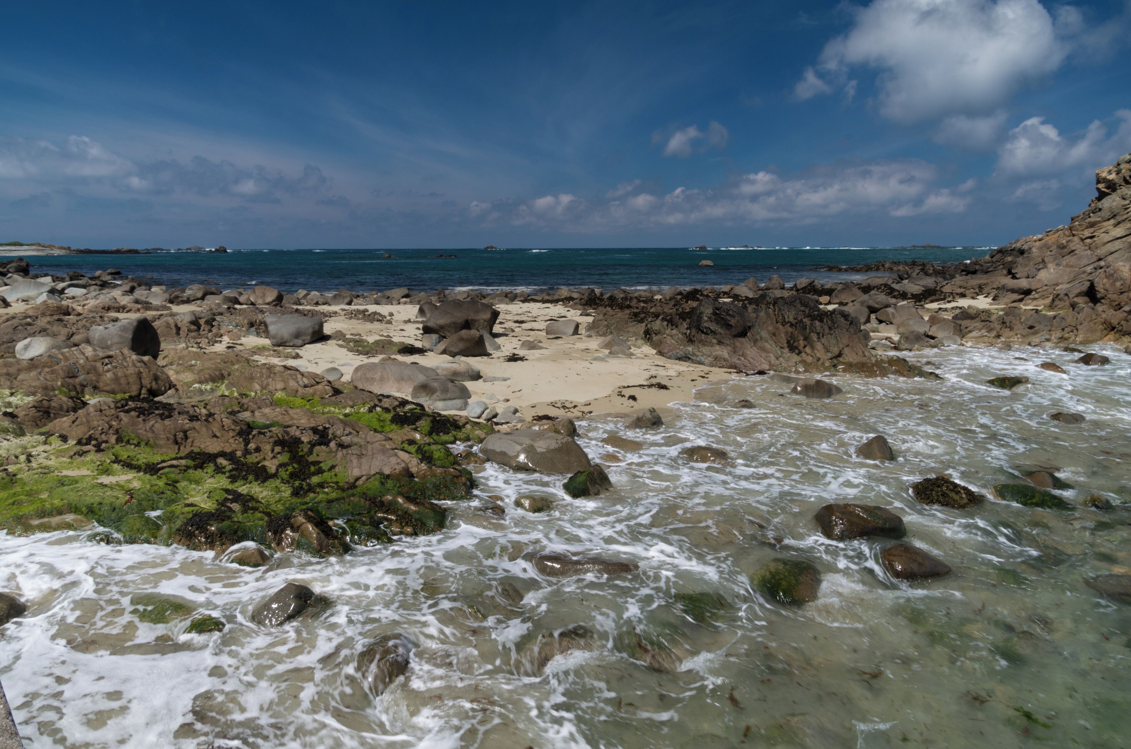 A little beach on the jentilez island in the sept-îles archipelago in Brittany (France) near the dock.