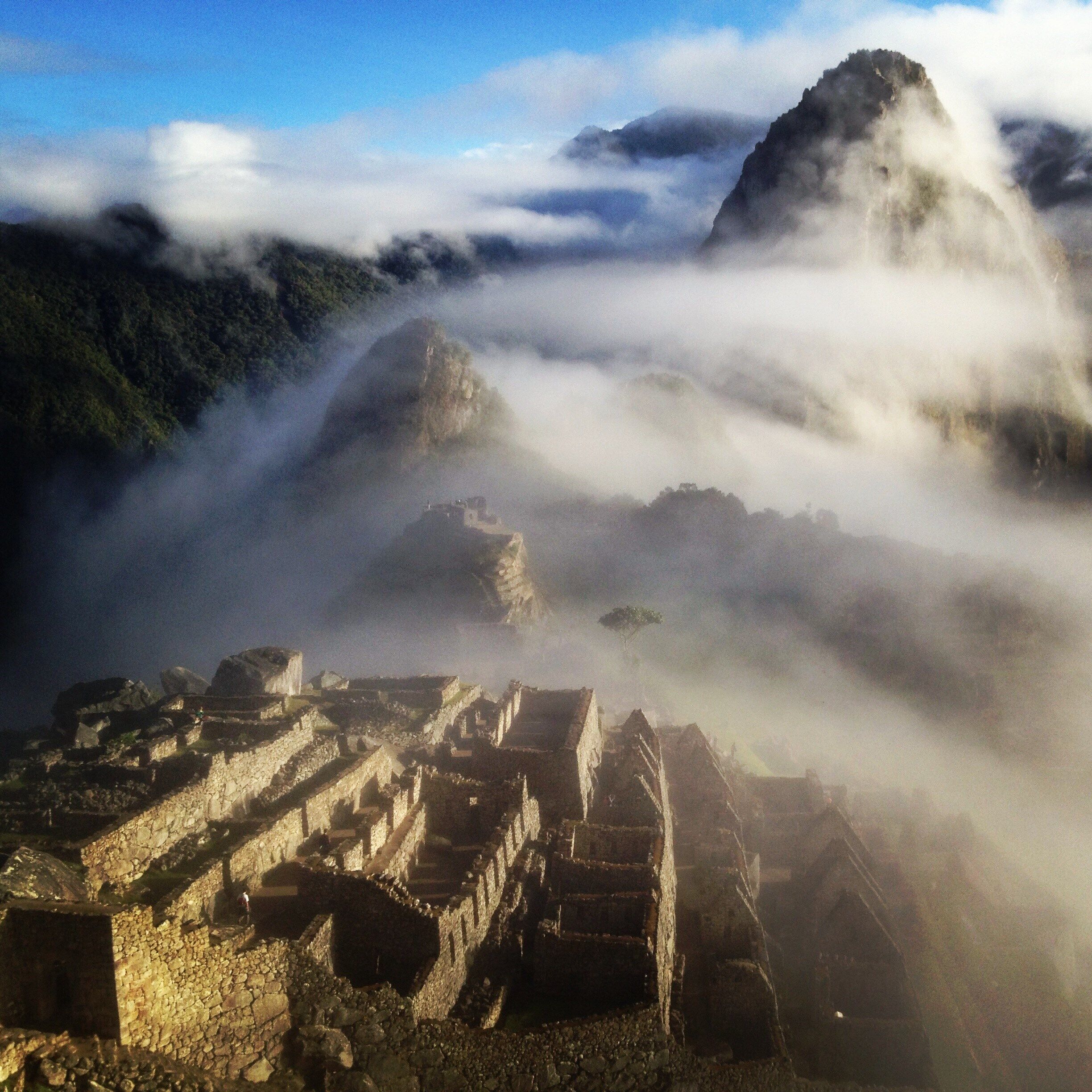 Morning fog blankets Machu Picchu at sunrise #LifeAtExpedia