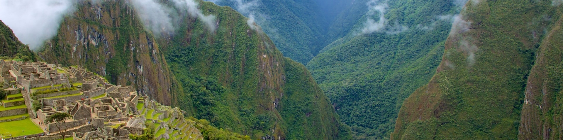 Cusco showing landscape views, mountains and a ruin