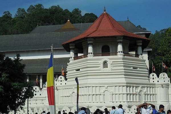 Sri Dalada Maligawa, also known as Temple of the Buddha Tooth in English, is a UNESCO heritage site, and a popular place to visit for newly weds. It was awfully packed over the full moon weekend (would not recommend visiting during this period)! This pavilion-like structure at the front Paththirippuwa, or Octagon. It is a symbol of identity in Kandyan Architecture. In the olden days, the king would stand there to address his citizens who were gathered in front of him. The golden roof behind stands over the Buddha tooth relic that this temple is famous for.
Footwear is not permitted inside, so you should either carry a bag where you can keep your shoes, or leave your shoes out on the grass like everyone else!
#srilanka #kandy #wanderlust #explore #adventure #travel #igtravel #instatravel #vacation #travelgram #trip #travelandleisure #asia #throwback #tourist #temple #religion #beautiful #traveltips #nofilter #picoftheday #architecture #buddhist #sridaladamaligawa