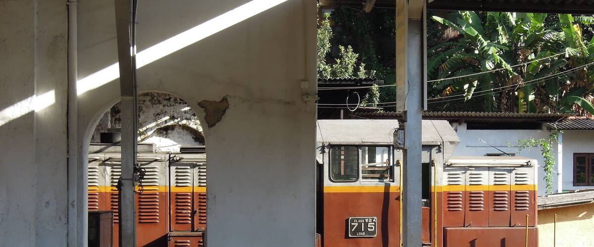 A train with the number 715 at a station.