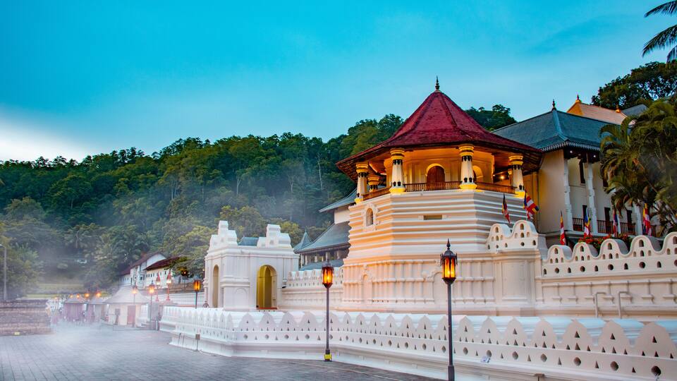 Temple of the tooth, a Buddhist temple also known as Sri Dalada Maligawa, covered with fog in Kandy, Sri Lanka. morning view, well famous destination among tourists.
