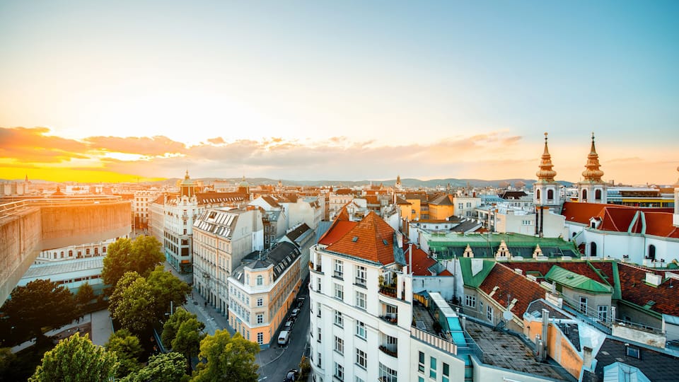 Panoramic cityscape view on Vienna city with Mariahilfer church towers on the sunset in Austria; Shutterstock ID 420504679