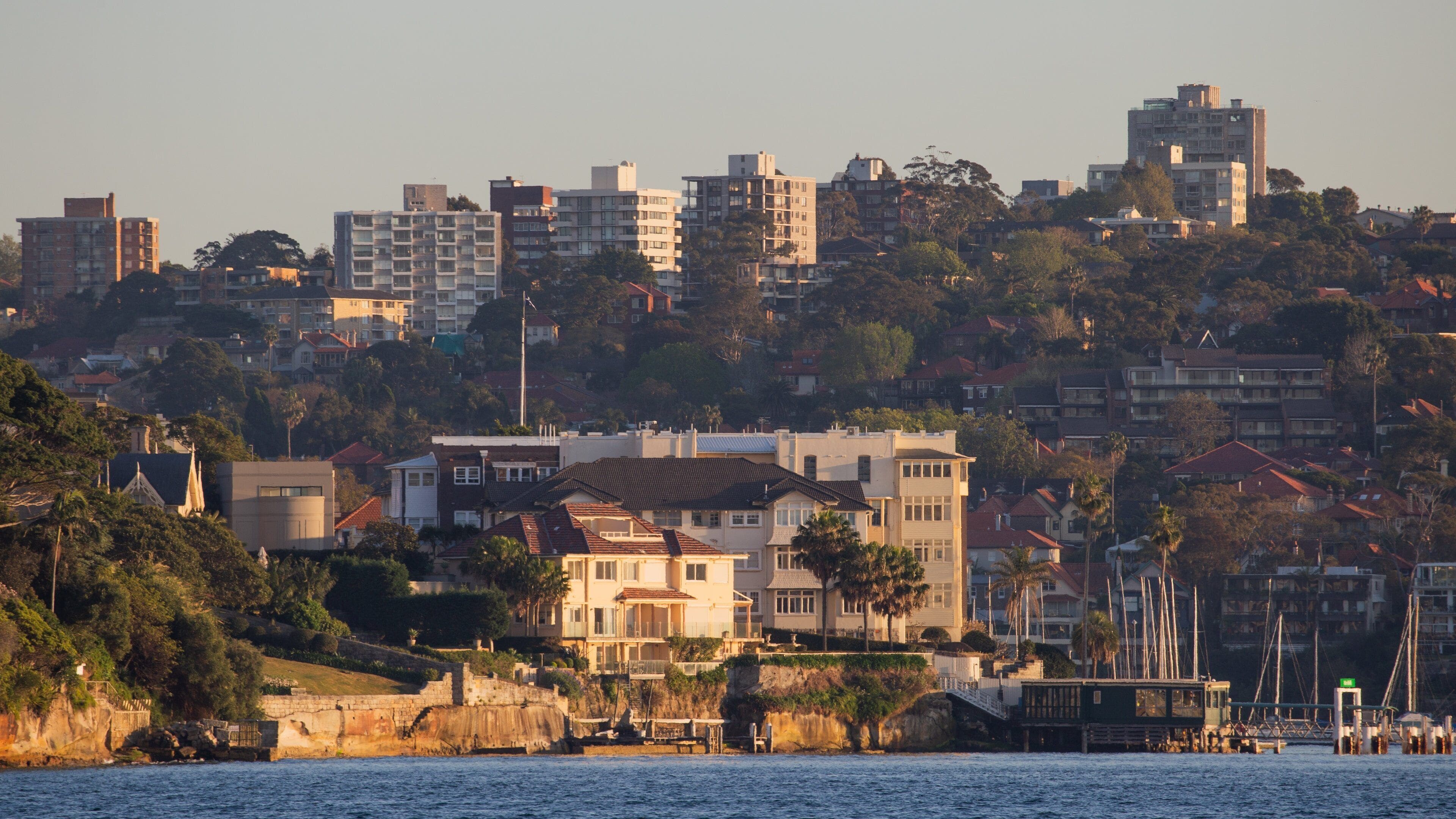 Kirribilli which includes a city, a sunset and a bay or harbor