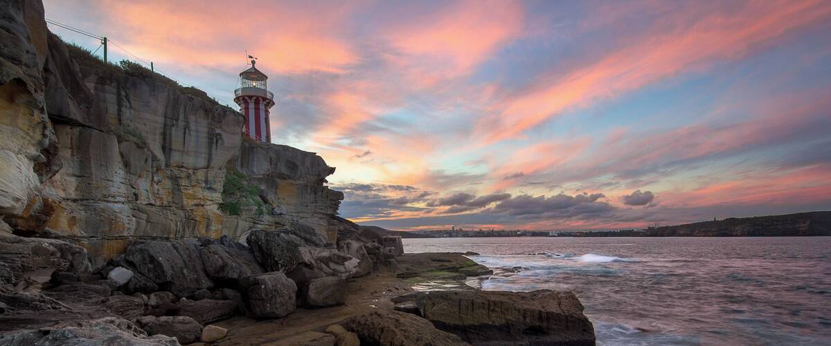 While most people get a shot from the top of the cliffs with a bit of scrambling along the rocks (much easier when the tide is lower) you can get to this vantage point.