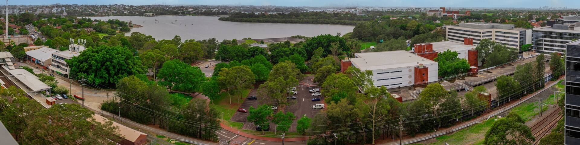 Panorama Aerial view above Rhodes with views to Meadowbank and Olympic park and Wentworth Point and Concord West with Parramatta River in Sydney NSW Australia