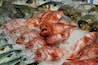 A variety of fresh fish on ice.