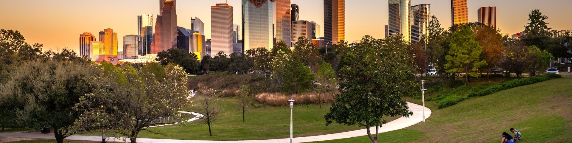 Houston Downtown modern business city with skyscraper city scape with park view from Buffalo Bayou center of Houston city, Texas, United States of America, US at sunset time
