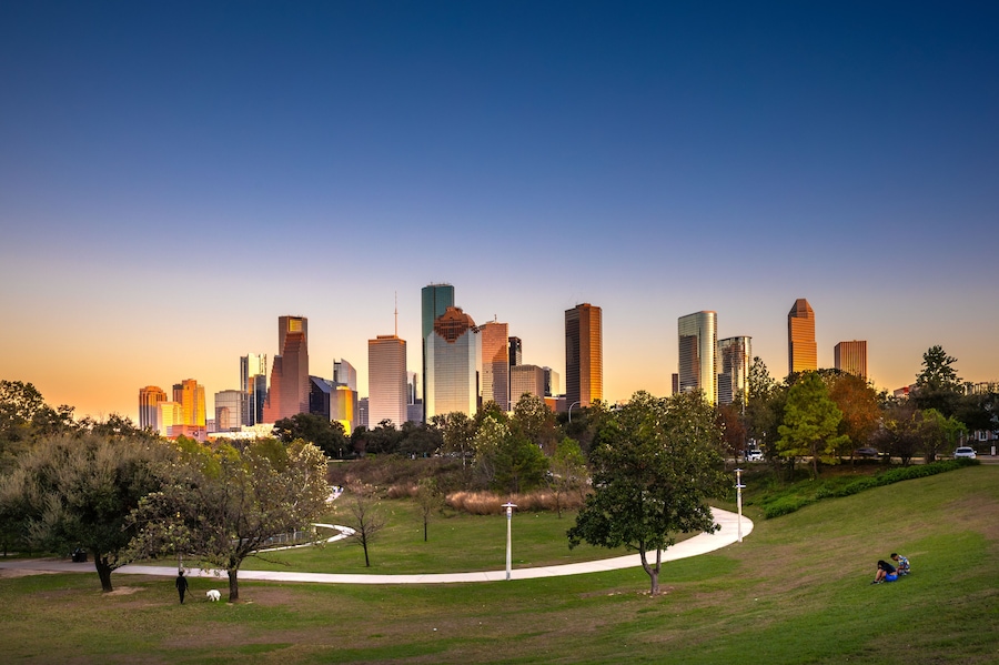 Houston Downtown modern business city with skyscraper city scape with park view from Buffalo Bayou center of Houston city, Texas, United States of America, US at sunset time