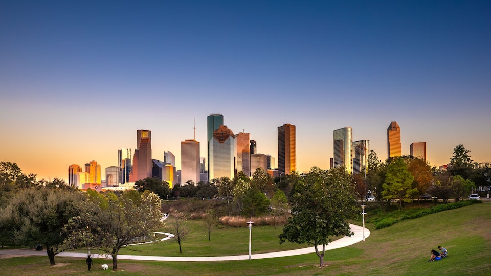 Houston Downtown modern business city with skyscraper city scape with park view from Buffalo Bayou center of Houston city, Texas, United States of America, US at sunset time