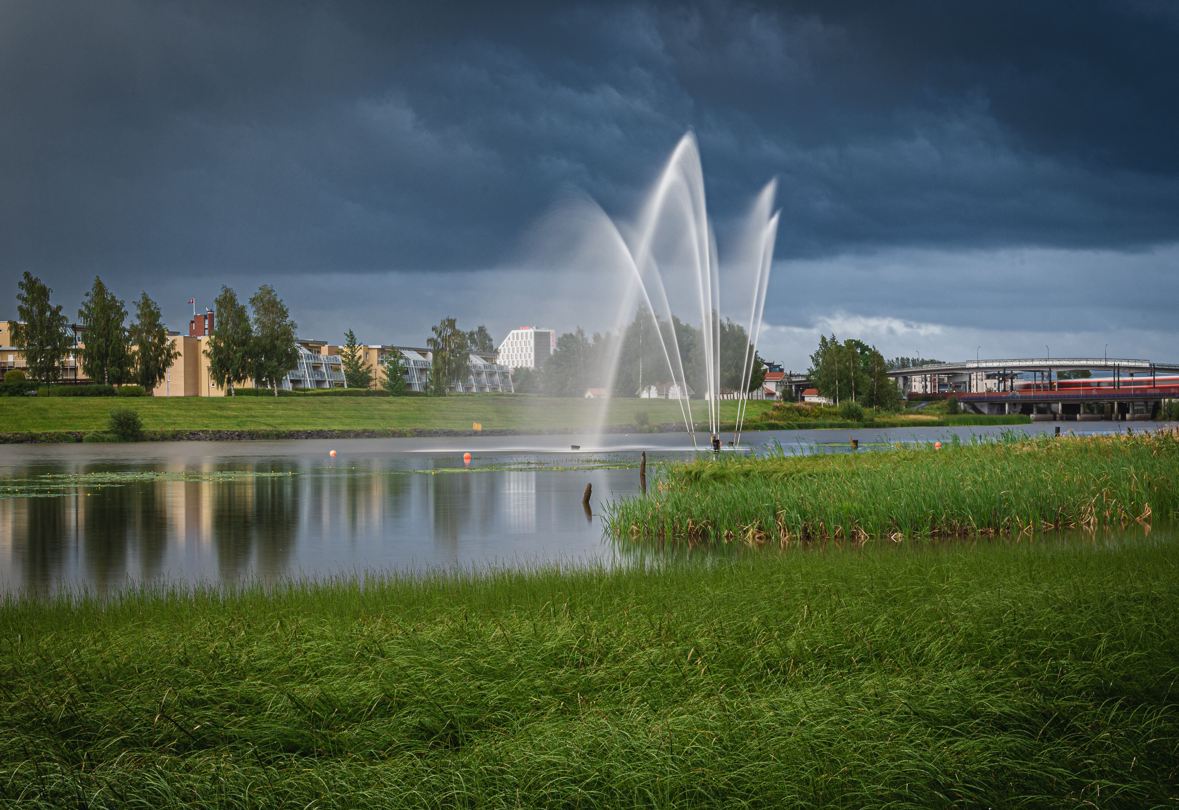 Fountain in the river of Nitelva in Lillestrom, Norway