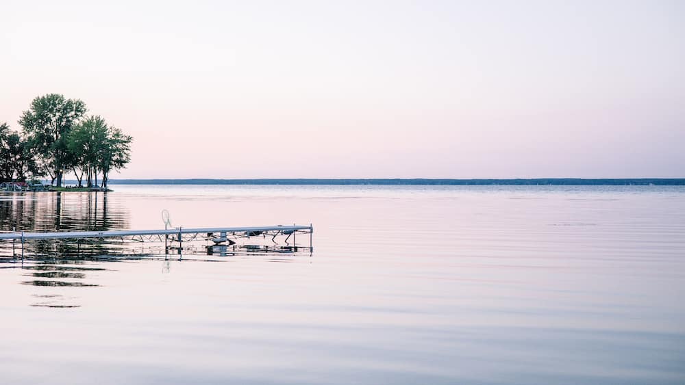 A purple sunset on the shoreline of Oneida Lake.