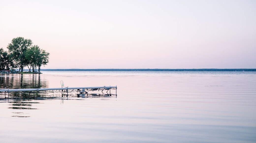 A purple sunset on the shoreline of Oneida Lake.