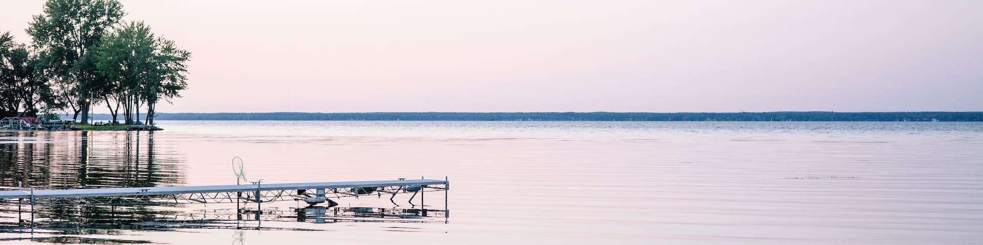 A purple sunset on the shoreline of Oneida Lake.