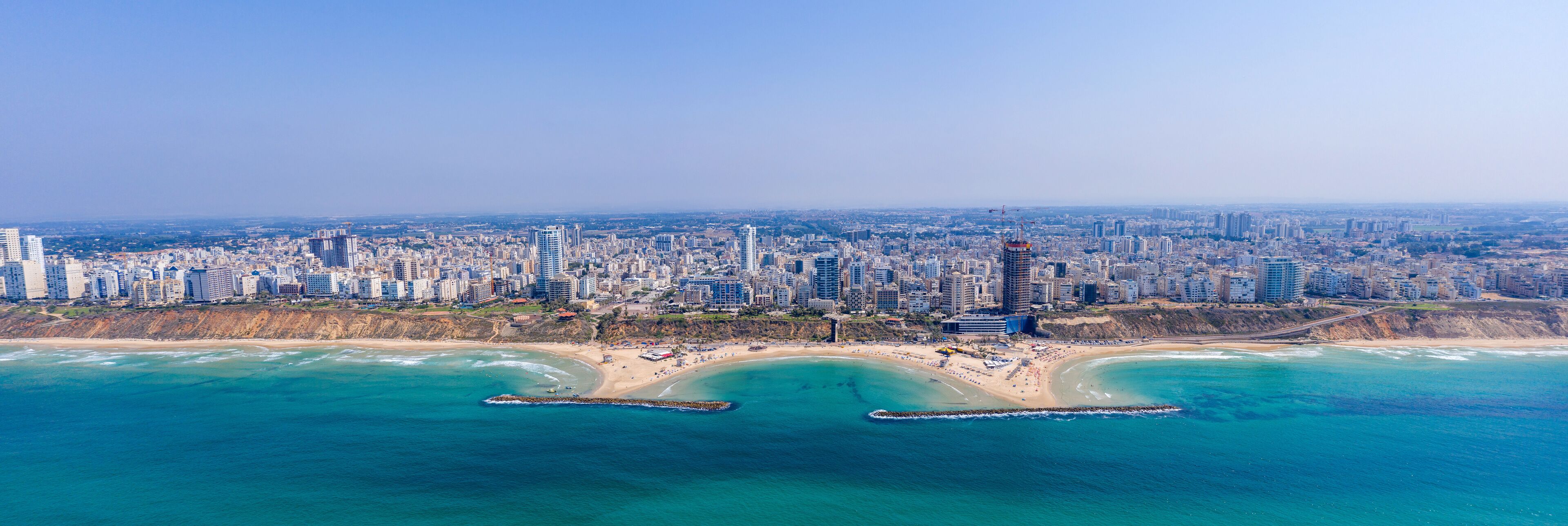 Aerial view of Netanya cliffside coastline, Israel.

