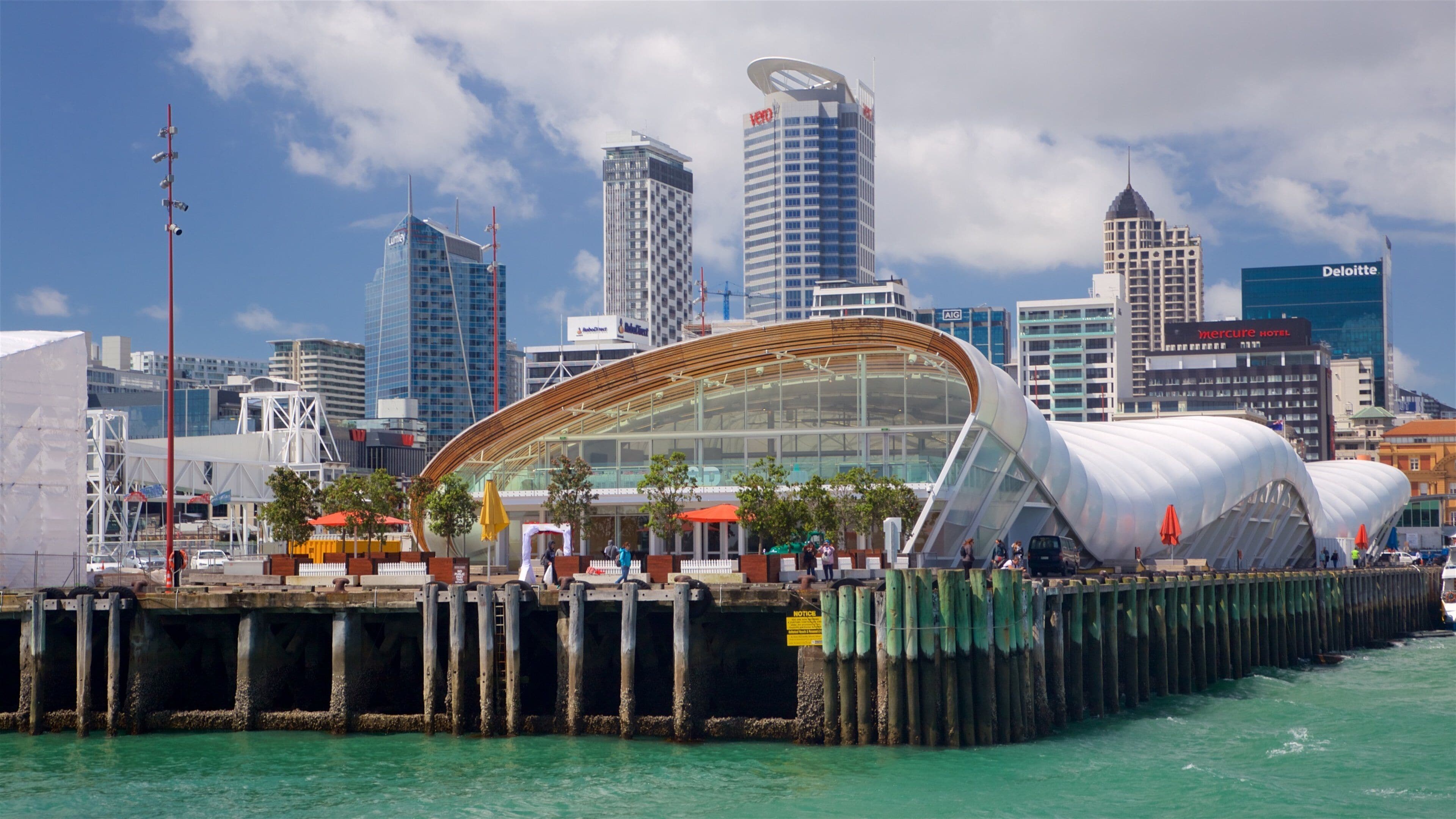 Auckland which includes a bay or harbor, a high rise building and a city