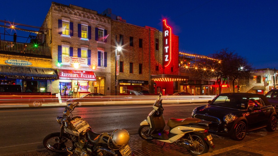 Austin featuring a city, signage and night scenes