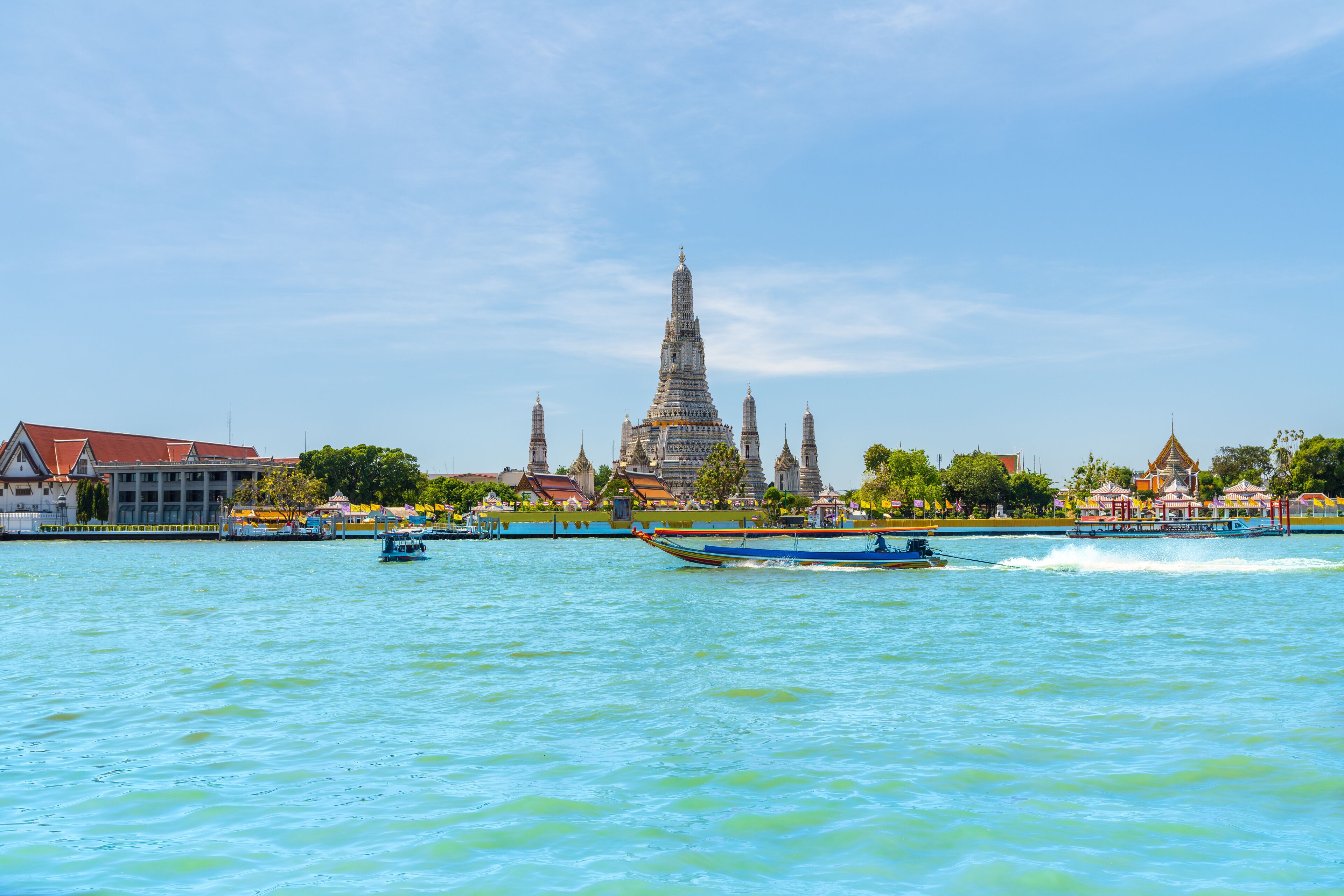 in Bangkok with Wat Arun temple and Chao Phraya River on the day, Wat Arun are travel destination of Bangkok, Thailand.