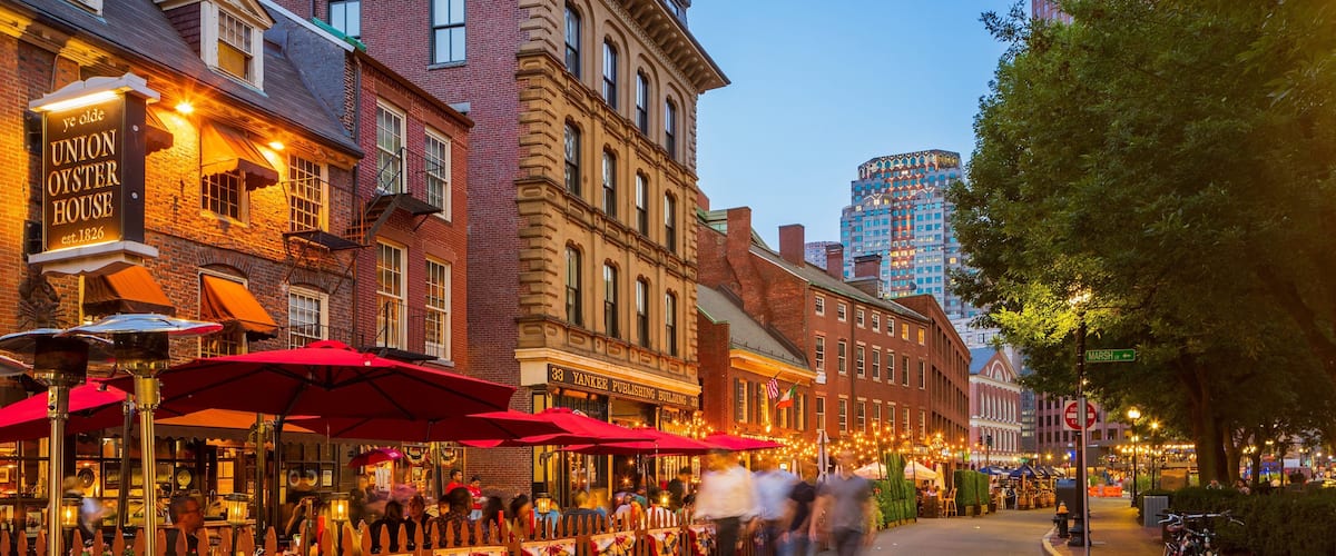 A street lined with historic buildings, including the Union Oyster House and Yankee Publishing Building.