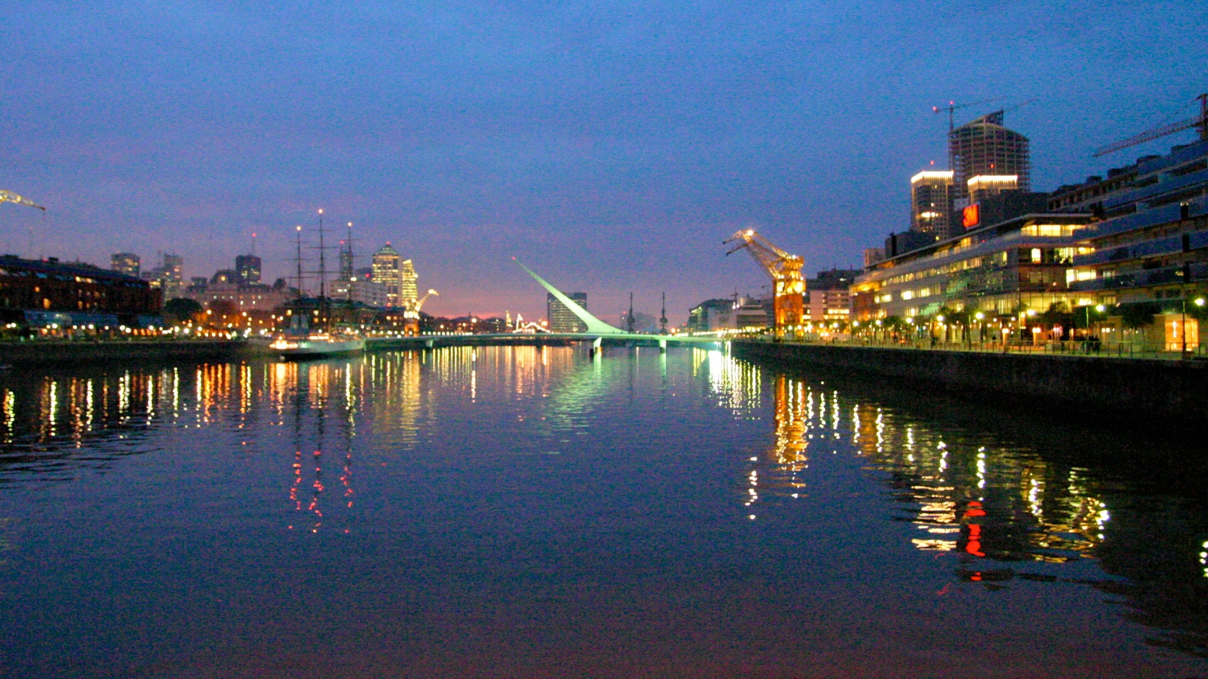 Buenos Aires showing a bay or harbor, skyline and a coastal town