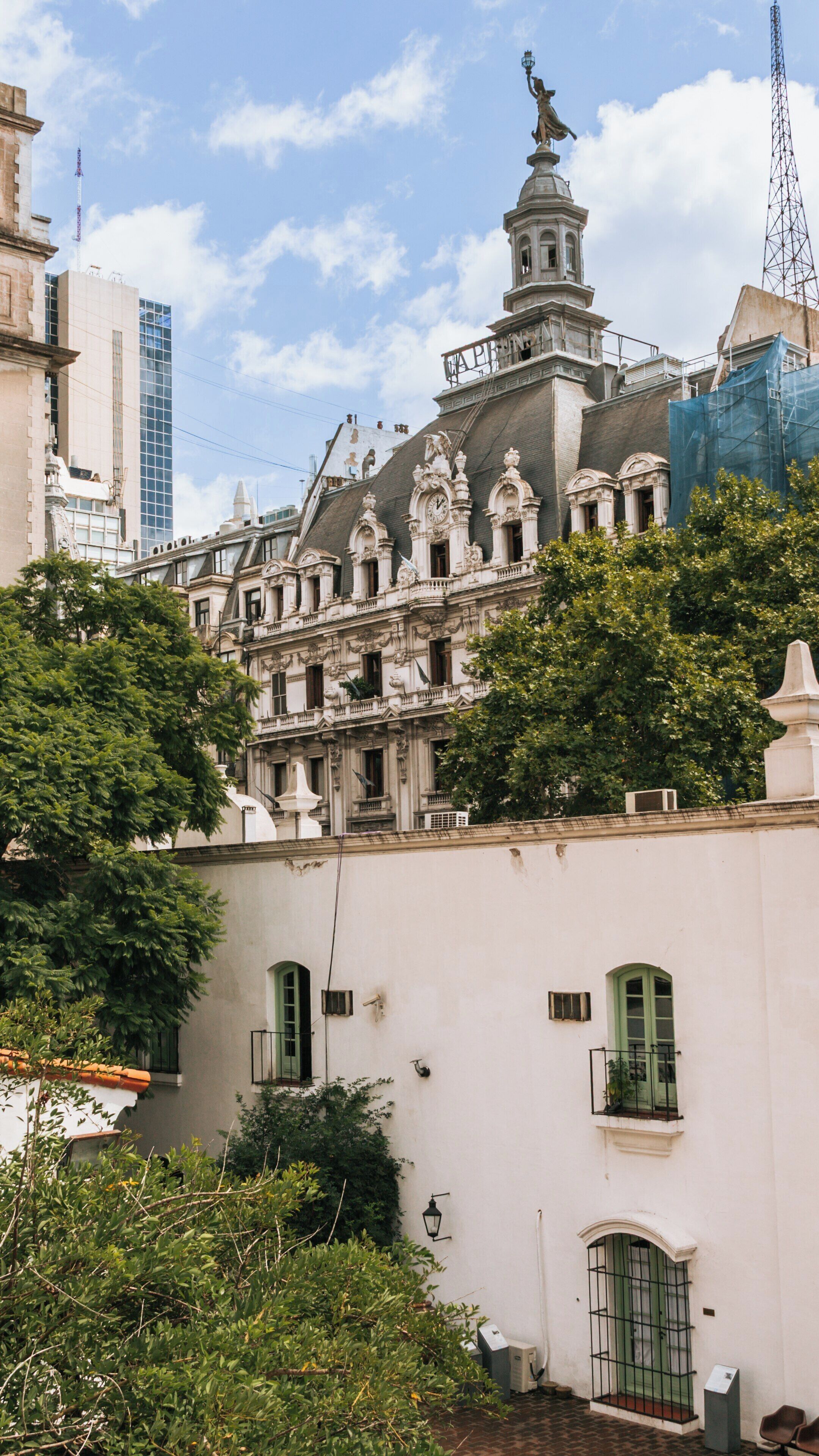 Stunning architecture of Cabildo in Monserrat, Buenos Aires showcasing historic charm and modern skyline against a clear sky