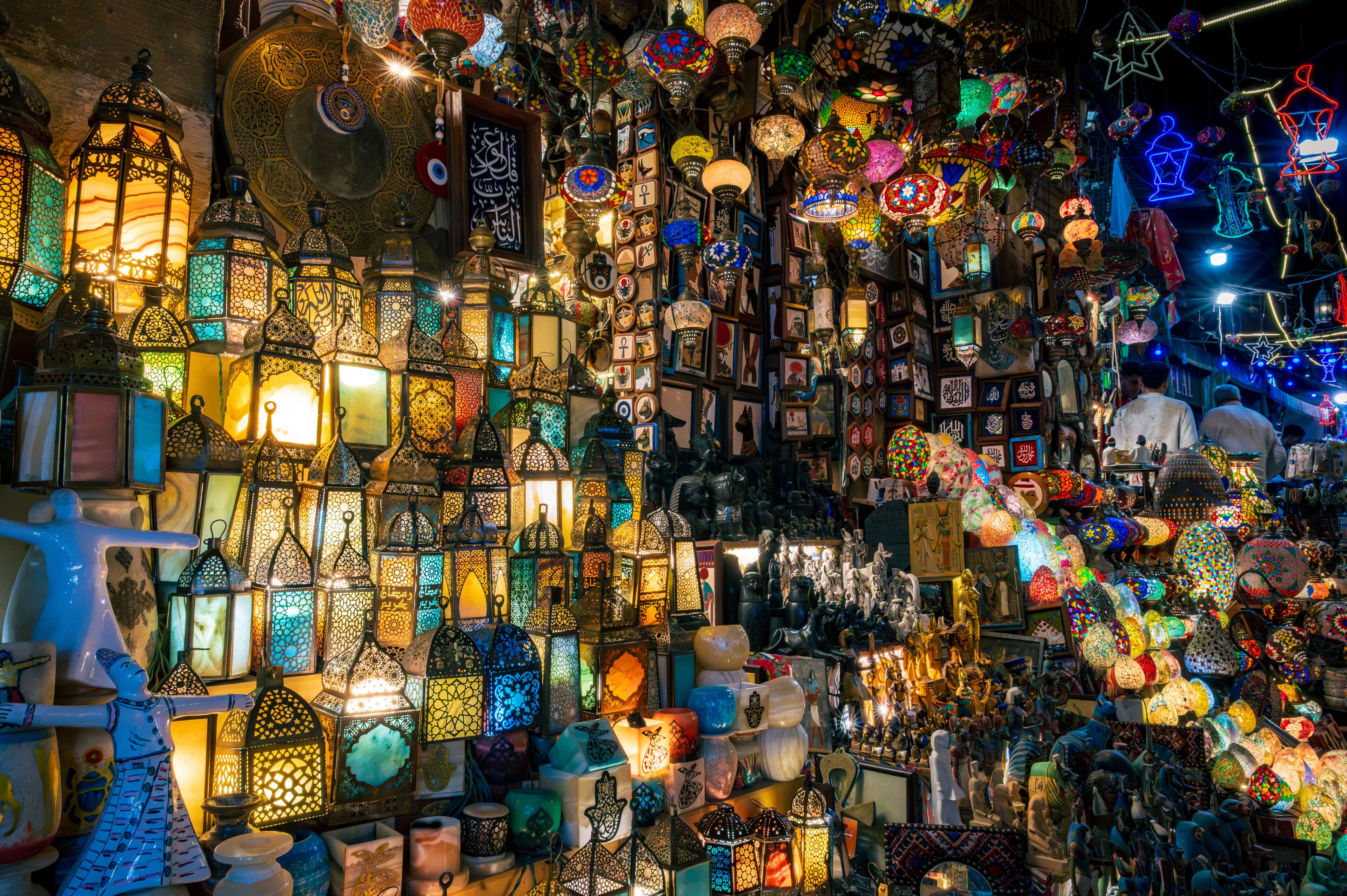 A densely packed market with various colorful lanterns and intricate designs.