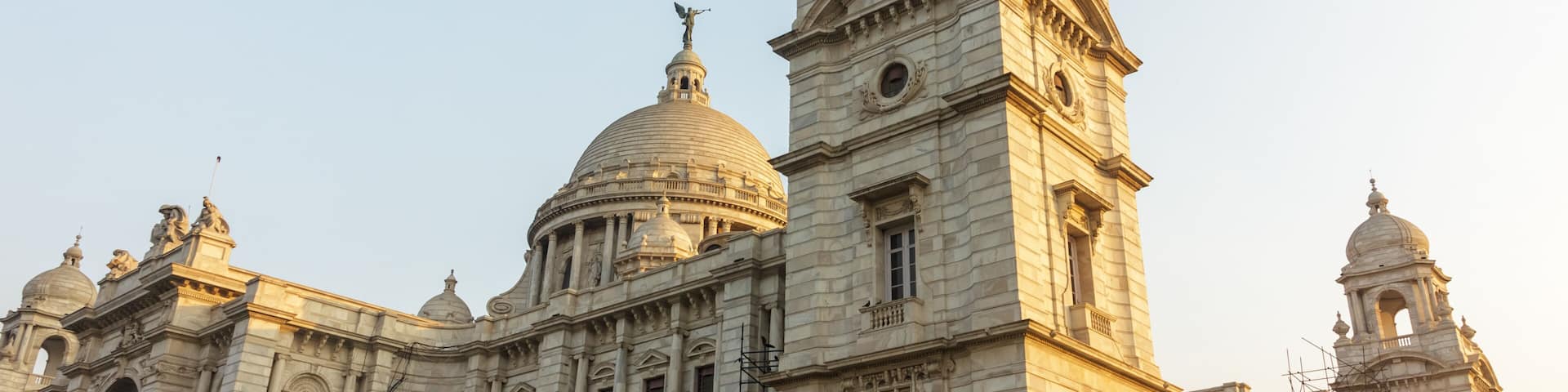 A large, ornate building with multiple domes and columns, likely a historical or religious structure.