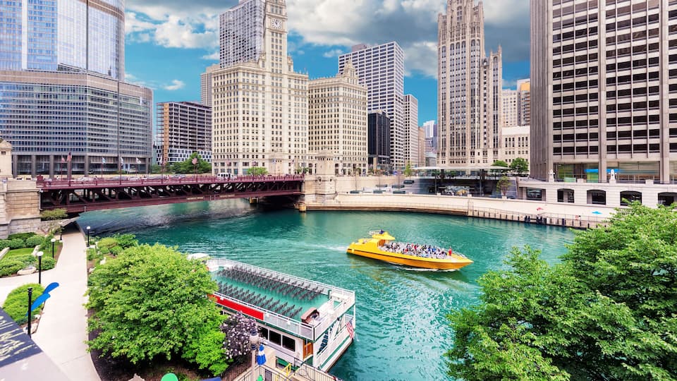 City of Chicago. Image of Chicago downtown and Chicago River with bridges at sunny summer day