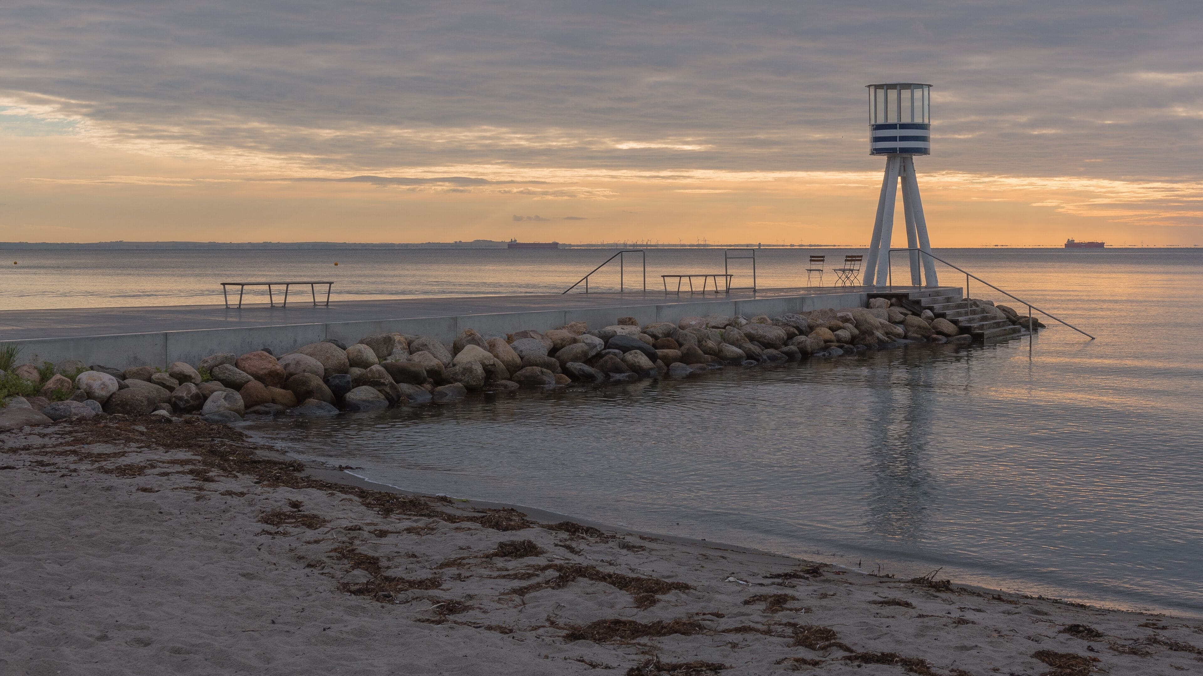The pier at Bellevue beach during a summer sunrise